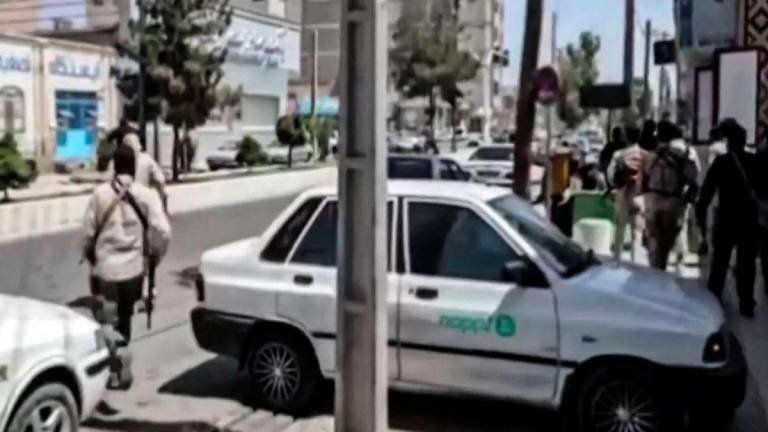 This image grab from a handout video provided by the Iranian judiciary's news agency Mizan Online on July 26, 2025, shows clashes in front of a judiciary building in Zahedan, the capital of southeastern Sistan-Baluchistan province. - AFPPIX via MIZAN NEWS AGENCY