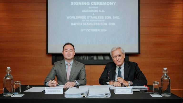 Left to right: Danny Tan, CEO of Worldwide Stainless, and Luis Gimeno, General Counsel and Secretary of the Board, Acerinox S.A.