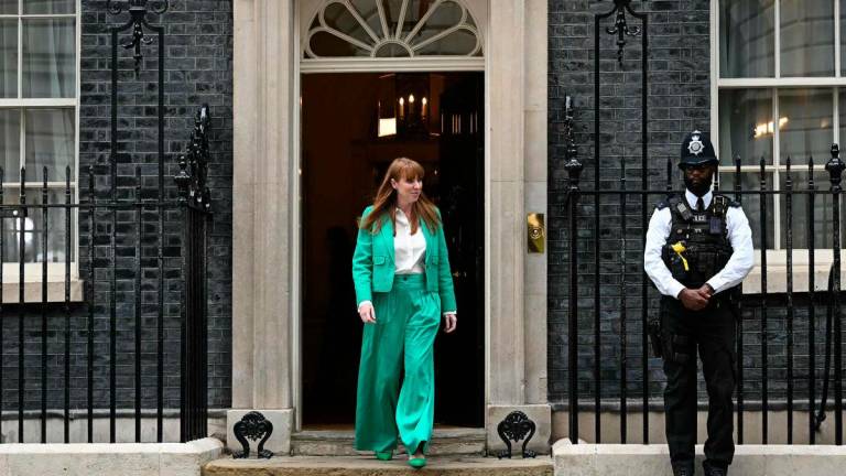 (FILES) Labour Party deputy leader Angela Rayner leaves 10 Downing Street after being named Britain’s deputy prime minister in London on July 5, 2024, a day after Britain held a general election. Angela Rayner resigned as deputy prime minister and secretary of state for housing communities and local governmentm, as well as deputy leader of the Labour party over tax error on September 5, 2025. (Photo by Paul ELLIS / AFP)