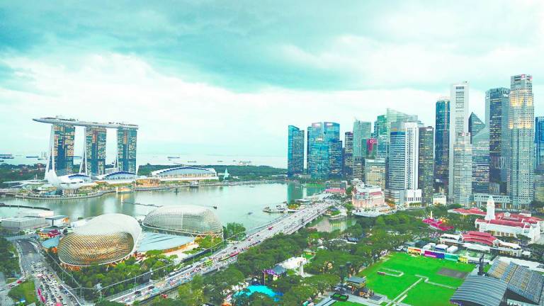 Singapore, with a climate similar to Malaysia’s, has succeeded in encouraging walkability and public transport usage. – REUTERSPIX