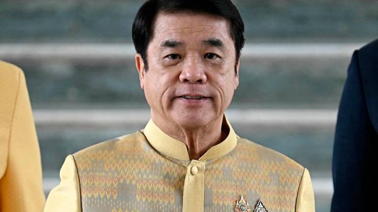 Thailand’s acting Prime minister Suriya Jungrungreangkit arrives at Government House in Bangkok on July 2, 2025. - Lillian SUWANRUMPHA / AFP