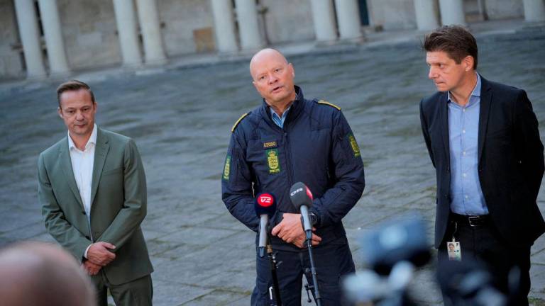 Police Inspector Jens Jespersen speaks to the media next to COO of Naviair Morten Fruensgaard and Chief Operating Officer (COO) of Copenhagen Airports Kristoffer Plenge-Brandt during a press conference at the police headquarters in Copenhagen, Denmark September 23, 2025. - Ritzau Scanpix/Emil Helms via REUTERSPIX