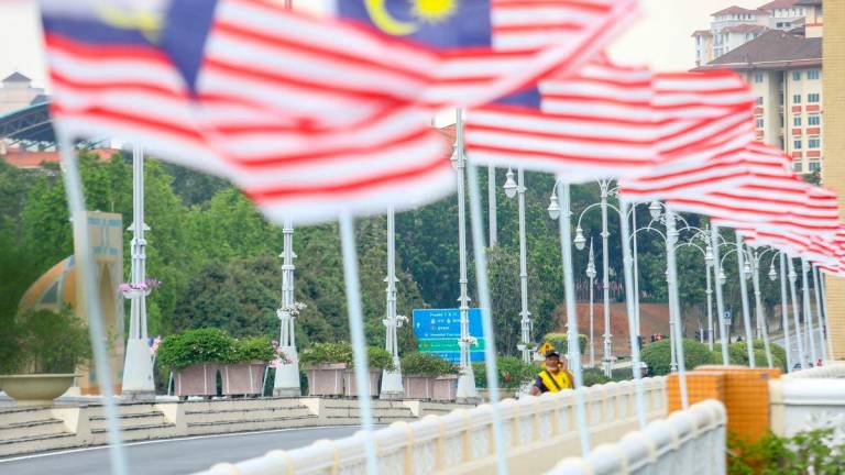 Gambar Hiasan Sahaja: Jalur Gemilang - AMIRUL SYAFIQ/ THESUN