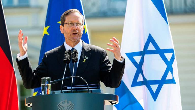 Israel's President Isaac Herzog gestures as he attends a press conference with German President Frank-Walter Steinmeier (not pictured) at Bellevue Palace in Berlin, Germany, May 12, 2025. - REUTERSPIX