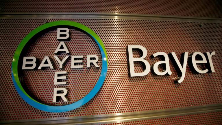 FILE PHOTO: Logo of Bayer AG is pictured at the annual results news conference of the German drugmaker in Leverkusen, Germany February 27, 2019. REUTERS/Wolfgang Rattay/File Photo