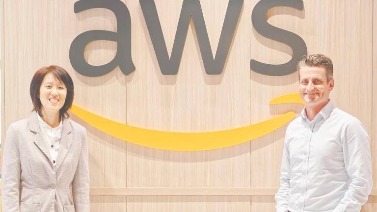 Liew (left) says 123RF is enhancing its platform with cutting-edge AI tools and Murray says AWS is fostering a collaborative ecosystem by working closely with government agencies, venture capital firms and local accelerators.