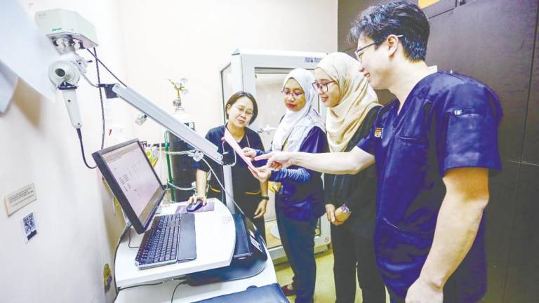 Physicians (from left) Dr Ban, Dr Nik Nuratiqah, Dr Nor Safiqah and Dr Ng stress on prevention, early detection and timely treatment to tackle pneumonia-related deaths. – AMIR HAMZAH/THESUN