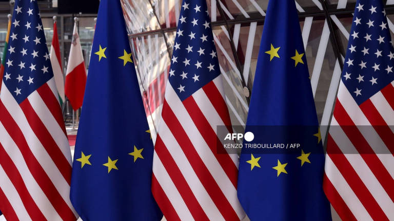 This pictures shows flags prior to an EU - US summit at the European Union headquarters in Brussels on June 15, 2021. - AFP