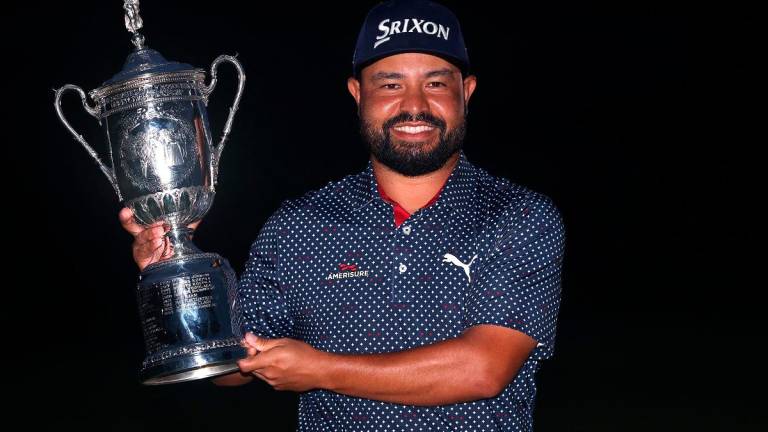 J. J. Spaun of the United States poses with the trophy after winning during the final round of the 125th U.S. OPEN at Oakmont Country Club on June 15, 2025 in Oakmont, Pennsylvania. - Warren Little/Getty Images/AFP
