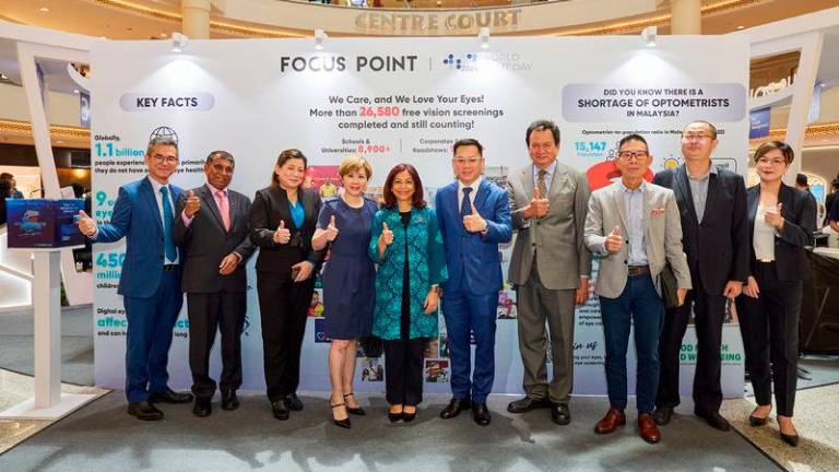 Ministry of Health secretary-general Datuk Seri Suriani Ahmad (5th from left), Focus Point president and CEO Datuk Liaw Choon Liang (6th from left) and some guests during the launch of the company’s World Sight Day 2024 campaign at the Mid Valley Megamall shopping centre.