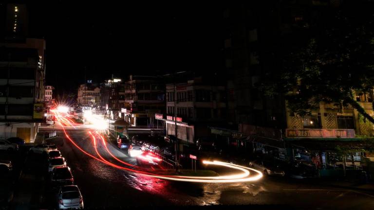 The Sandakan city centre was in darkness due to a power outage during an inspection last night. The entire east coast of Sabah was plunged into darkness after a power disruption occurred at 5.05pm when the 275KV Kolopis-Segaliud transmission line experienced a fault. – BERNAMA