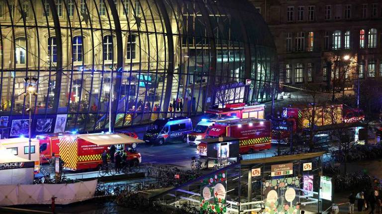 Firefighters’ and rescue vehicles are stationed outside the Strasbourg railway station following a collision of two trams, in Strasbourg, eastern France, on January 11, 2025. Two trams collided in a tunnel in the eastern French city of Strasbourg on January 11, 2025, injuring twenty people, the authorities said. “Twenty people” have been injured, said a spokesman for the prefecture, adding that the cause of the accident had not yet been established. - FREDERICK FLORIN / AFP