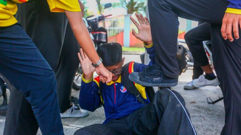 Siti Khadijah said anti-bullying efforts must address underlying causes such as family environment, peer influence and self-esteem rather than relying on public declarations. – ADAM AMIR HAMZAH/THESUN