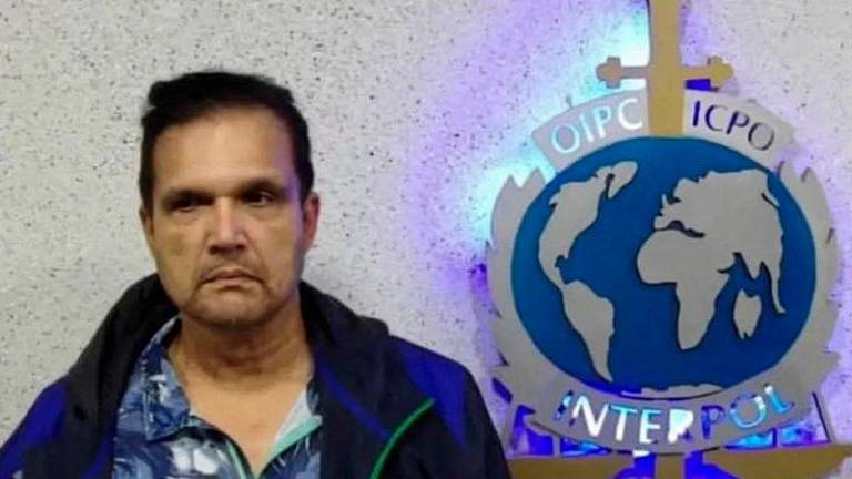 Undated handout picture released on September 21, 2022 by the Instagram account of Interpol Venezuela shows Malaysian fugitive Francis Leonard Glenn, known as “Fat Leonard”, after his capture in Maiquetia, Venezuela. AFPpix