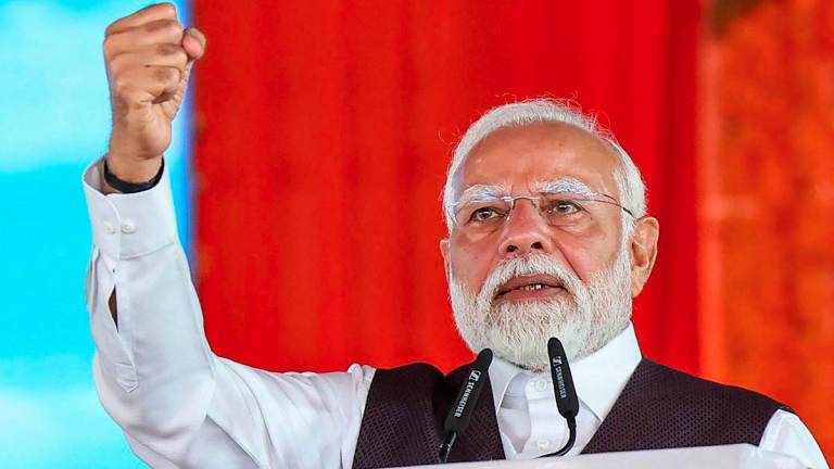This photograph taken and released by the Indian Press Information Bureau (PIB) on June 6, 2025, shows India's Prime Minister Narendra Modi addressing the public during the inauguration of various projects at Katra in Jammu and Kashmir. - AFPPIX
