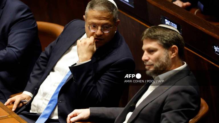 Itamar Ben-Gvir (L) and Bezalel Smotrich. - AMIR COHEN / POOL / AFP