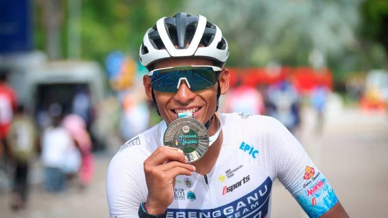 Reaksi pelumba Terengganu Cycling Team (TSG), Muhammad Nur Aiman Rosli selepas menamatkan saingan di tempat kedua pada perlumbaan peringkat ketujuh Le Tour de Langkawi (LTDL 2025) dari Melaka ke Medini hari ini- fotoBERNAMA