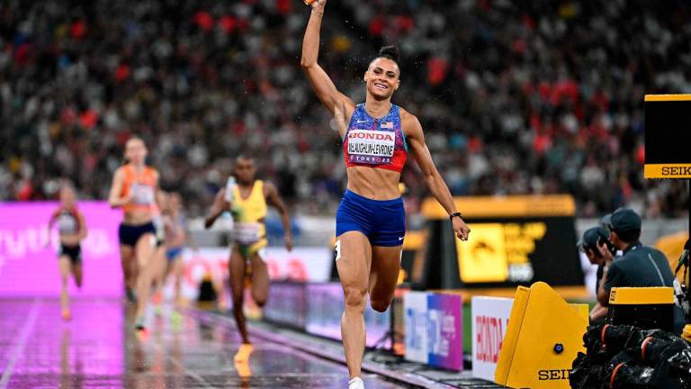 US’ Sydney McLaughlin-Levrone celebrates winning the women’s 4x400m relay final during the World Athletics Championships in Tokyo on September 21, 2025. - Jewel SAMAD / AFP