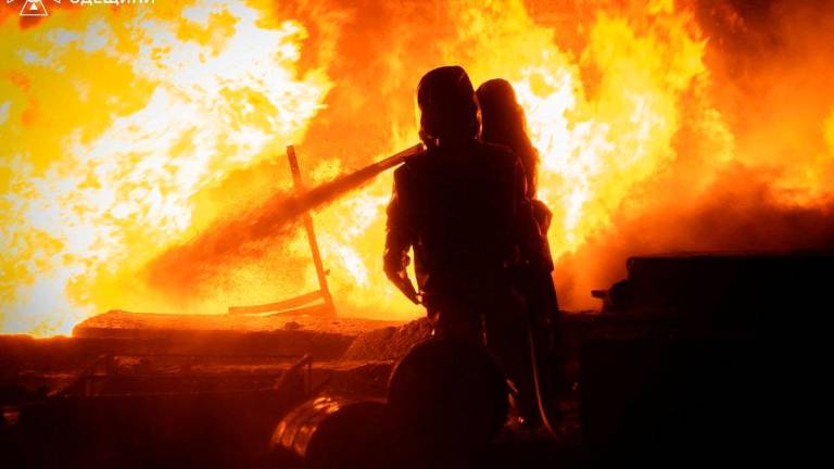 Firefighters work at the site of a Russian drone strike, amid Russia’s attack on Ukraine, in Odesa, Ukraine in this handout picture released August 18, 2025. Press service of the State Emergency Service of Ukraine in Odesa region/Handout via REUTERS