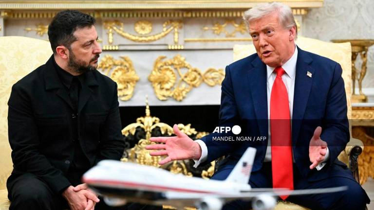 Ukrainian President Volodymyr Zelensky and US President Donald Trump. - Mandel NGAN / AFP