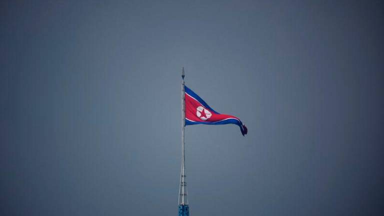 A North Korean flag flutters at the propaganda village of Gijungdong in North Korea, in this picture taken near the truce village of Panmunjom inside the demilitarized zone (DMZ) separating the two Koreas, South Korea - REUTERSpix