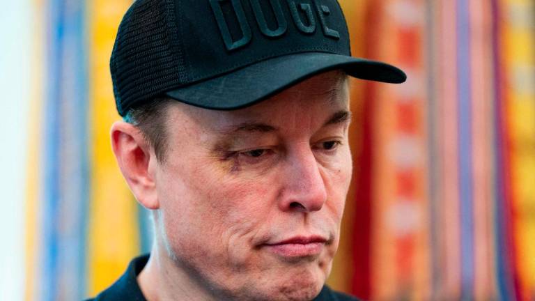 Elon Musk looks on during a news conference with US President Donald Trump in the Oval Office of the White House in Washington, DC, on May 30, 2025. - AFPPIX