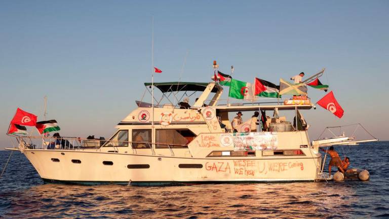 A boat, part of the Global Sumud Flotilla aiming to reach Gaza and break Israel’s naval blockade, sails off Koufonisi islet, Greece, September 26, 2025. REUTERS/Stefanos Rapanis