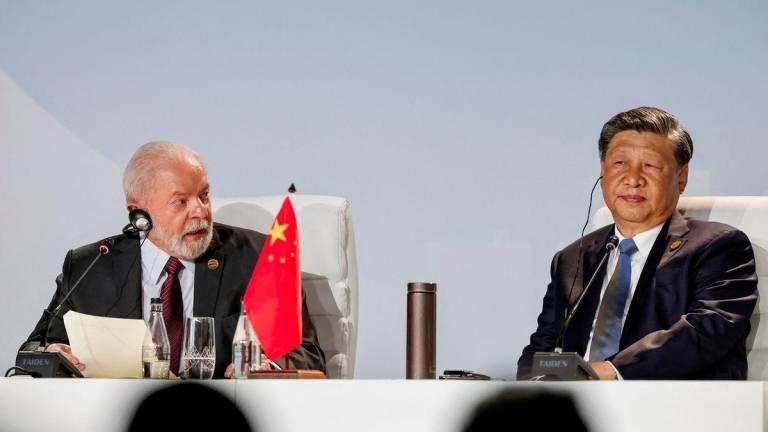 President of Brazil Luiz Inacio Lula da Silva (L) and President of China Xi Jinping (R) attend the 2023 BRICS Summit at the Sandton Convention Centre in Johannesburg on August 24, 2023. - REUTERSPIX