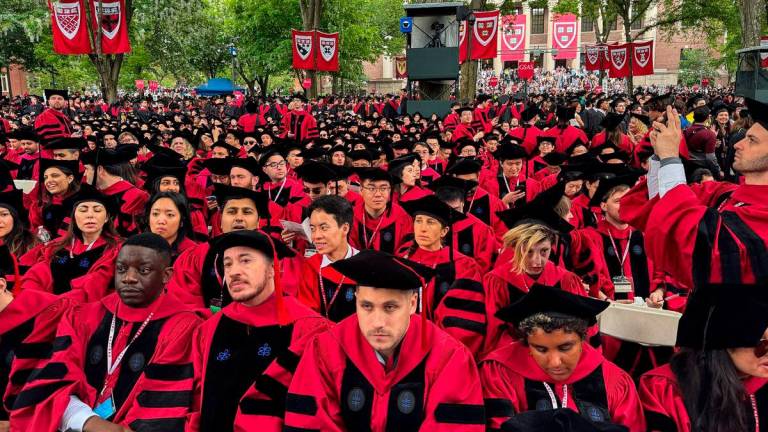 FILEpix: Graduates gather as they attend commencement ceremony at Harvard University in Cambridge, Massachusetts, on May 29, 2025. AFP