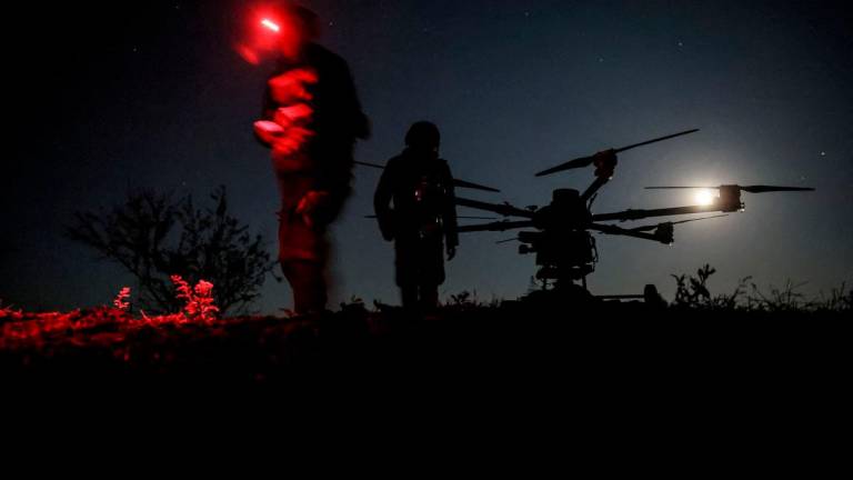 Servicemen of 24th Mechanized Brigade named after King Danylo of the Ukrainian Armed Forces stand near a Kazhan heavy combat drone before flying it over positions of Russian troops, amid Russia’s attack on Ukraine, near the frontline town of Chasiv Yar in Donetsk region, Ukraine May 15, 2025. REUTERSpix