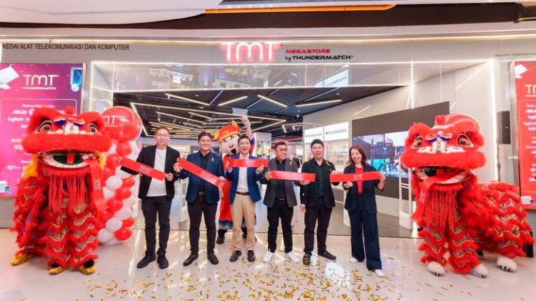 Mr. Eric Chan (second from left), Sales &amp; Marketing Director of TMT, officiating the grand opening of TMT’s Largest Megastore at Sunway Pyramid. Together with him are Mr Jason Chin (left), Senior General Manager of Sunway Pyramid, Sunway Giza &amp; Sunway Square; Mr. Harry Higashiura (third from left), CEO of Nojima APAC Limited; Mr. Lim Chin Keat (fourth from left), Sales Director of TMT; Mr. Ronald Cheong (second from right), Product Director of TMT; and Ms Loo Hoey Theen (right), General Manager - Marketing and Business Innovation of Sunway Malls.