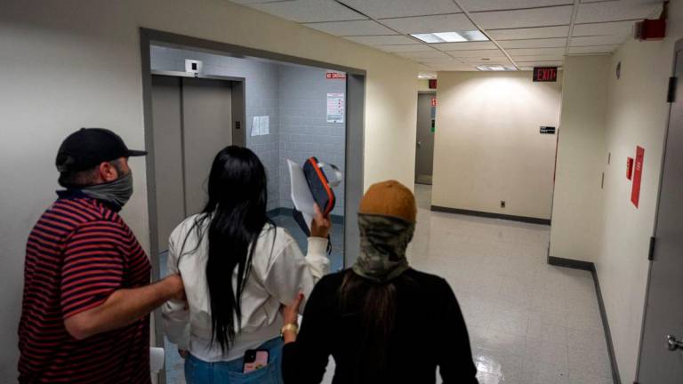 For representational purposes only: Federal immigration officers detain a migrant, after she attended a hearing at U.S. immigration court in Manhattan, in New York City, U.S., September 12, 2025. REUTERS/David ‘Dee’ Delgado