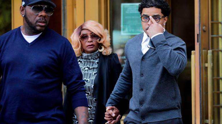 Janice Combs (C), mother of Sean “Diddy” Combs, and Justin Combs, son of Sean “Diddy” Combs,“ depart federal court in Manhattan during a break in Sean “Diddy” Combs’s sex trafficking trial. AFPPIX
