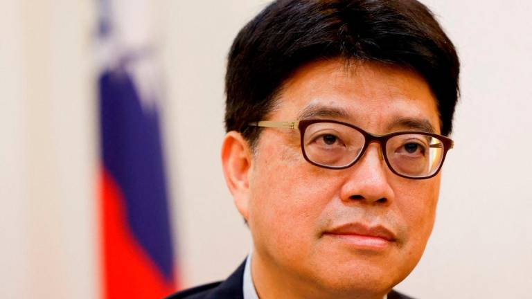 FILE PHOTO: Taiwan’s Mainland Affairs Council Minister Chiu Chui-cheng attends an interview with Reuters in Taipei, Taiwan May 27, 2025. REUTERS/Ann Wang/File Photo