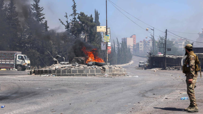 Tribal and bedouin fighters deploy amid clashes with Druze gunmen in the predominantly Druze city of Sweida in southern Syria on July 19, 2025. - AFP