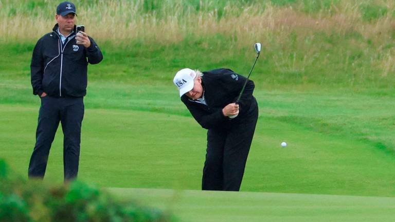 President USA Donald Trump bermain golf di Trump Turnberry resort di Turnberry, Scotland - REUTERS/Phil Noble TPX IMAGES OF THE DAY