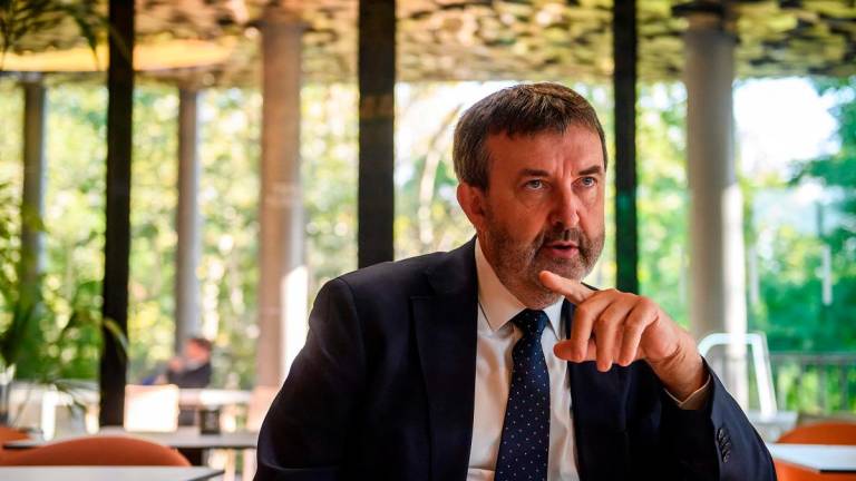 The Hungarian government’s AI Commissioner Laszlo Palkovics speaks during an AFP interview on the sidelines of a two-day AI conference at the Hungarian House of Music in Budapest, Hungary, on September 8, 2025. - FERENC ISZA / AFP
