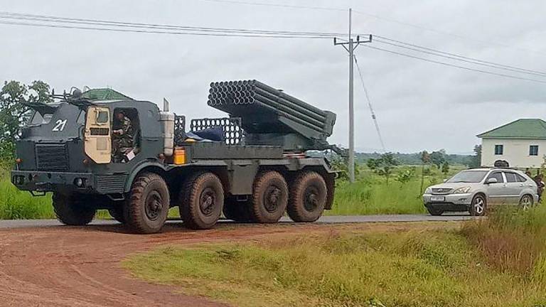 A Cambodian BM-21 multiple rocket launcher returns from the Cambodia-Thai border as Cambodian and Thai troops exchanged fire in a new round of clashes in Preah Vihear province on July 24, 2025. - AFP