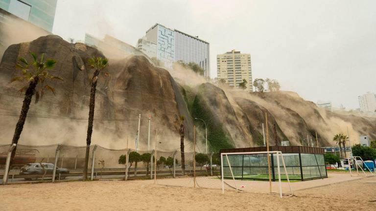Dust billows out of a landslide during an earthquake in Lima on June 15, 2025. A magnitude 6.1 earthquake that shook Lima and its surrounding areas caused one death in Peru’s capital and several landslides. AFPpix