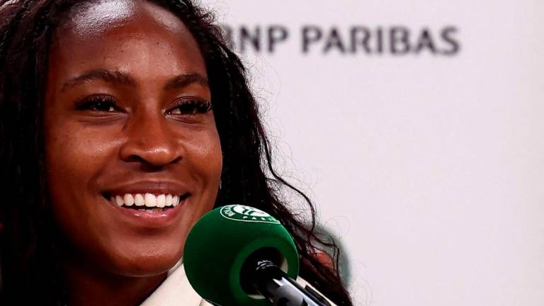 US Coco Gauff addresses a press conference after winning her women’s singles semi-final match against France’s Lois Boisson on day 12 of the French Open tennis tournament at the Roland-Garros Complex in Paris on June 5, 2025. AFP