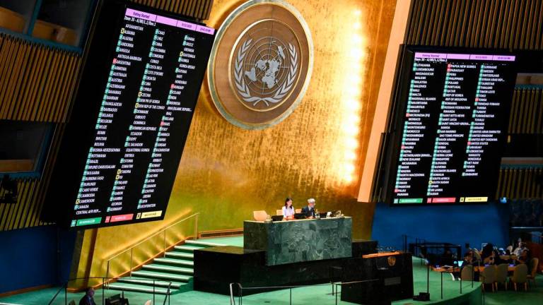 Results are displayed during a General Assembly meeting to vote on the two states solution to the Palestinian question at United Nations headquarters (UN) on September 12, 2025 in New York City. (Photo by ANGELA WEISS / AFP)