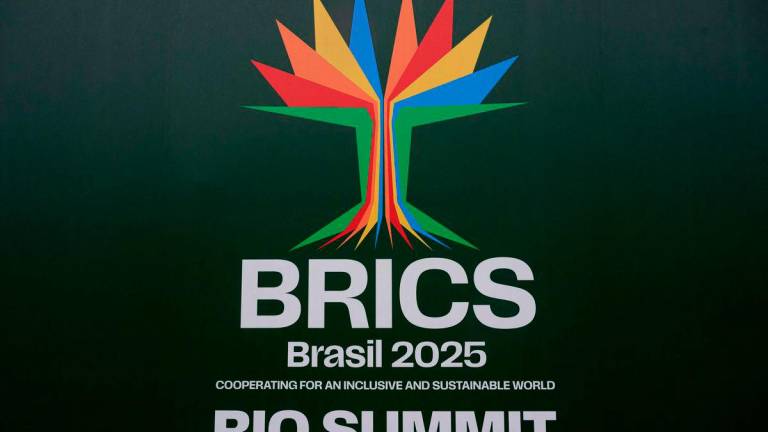 A banner of the BRICS summit is displayed at the Modern Art Museum (MAM) where the BRICS summit 2025 will be held in Rio de Janeiro - Photo by Pablo PORCIUNCULA / AFP