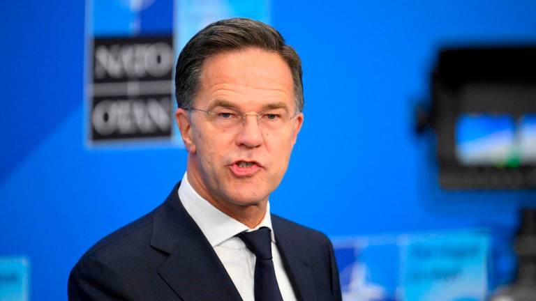 NATO Secretary General Mark Rutte speaks to the media during his opening address of the NATO summit of heads of state and government in The Hague on June 25, 2025. - JOHN THYS / AFP