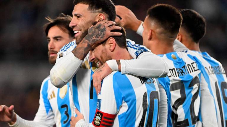 Argentina’s forward #10 Lionel Messi (C) celebrates with teammates after scoring his second goal during the 2026 FIFA World Cup South American qualifiers football match between Argentina and Venezuela at the Mas Monumental stadium. AFPPix