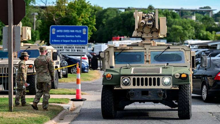 A Humvee vehicle leaves the Anacostia Park Police Field Office after U.S. President Donald Trump announced federal take over of the Metropolitan Police Department under the Home Rule Act and the deployment of the National Guard to assist in crime prevention in the nation's capital, in Washington, D.C., August 12, 2025. - REUTERSPIX