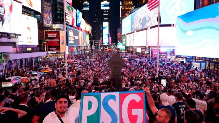 Paris Saint-Germain fans gather at Times Square in New York on July 11, 2025, ahead of the FIFA Club World Cup 2025 final football match between England’s Chelsea and France’s Paris Saint-Germain on July 13. Photo by FRANCK FIFE / AFP