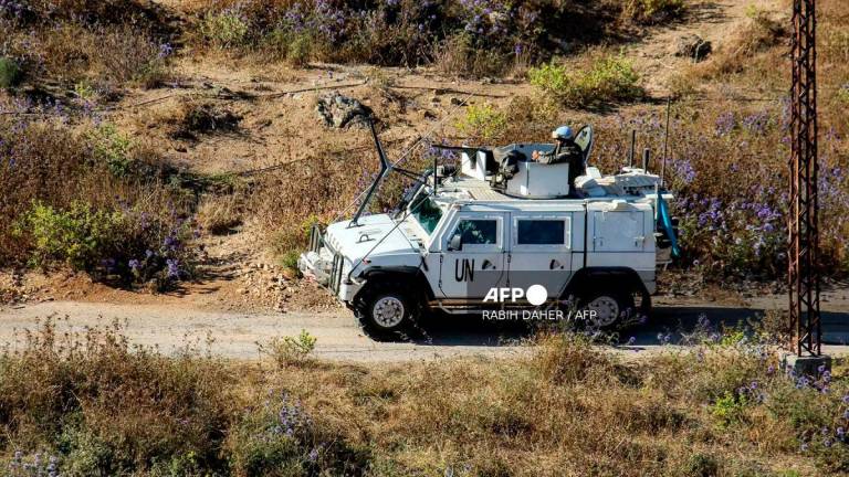 One of the armoured vehicles of the United Nations Interim Force in Lebanon (UNIFIL) peacekeepers patrols in the Buwayda region of Marjayoun in southern Lebanon by the border with Israel on July 4, 2025. - Rabih DAHER / AFP