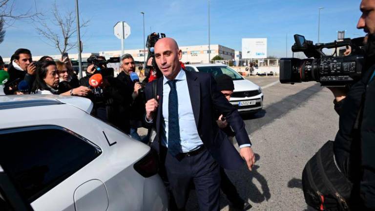 Former president of the Spanish football federation Luis Rubiales leaves the court of San Fernando de Henares, east of Madrid, on February 14, 2025, on the last day of his trial for sexual assault. - AFPPIX