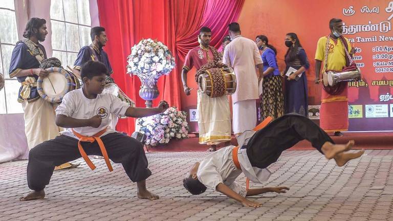 Gambar Hiasan sahaja: Students of the ancient Indian martial art Silambam show their skills during Tamil New Year Puttaandu Celebration at the Kala Mandapam Sri Kandaswamy Temple, Brickfields Kuala Lumpur. adib rawi yahya/theSun