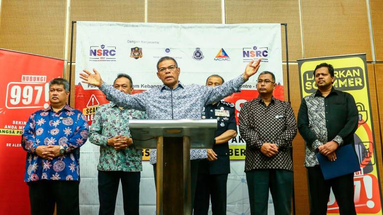 The move to Cyberjaya will see an increase in staffing and operational capacity, allowing the NSRC to function more effectively, said Saifuddin (at rostrum). – ADIB RAWI YAHYA/THESUN